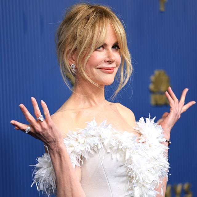 Nicole Kidman in her white Chanel gown with floral detailing